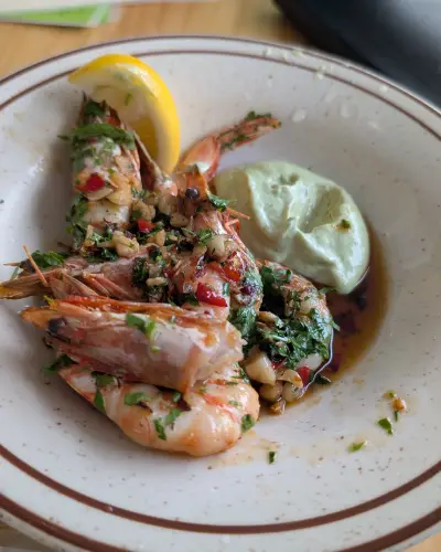 Whole tiger prawns with chilli, herbs, lemon and green mayo